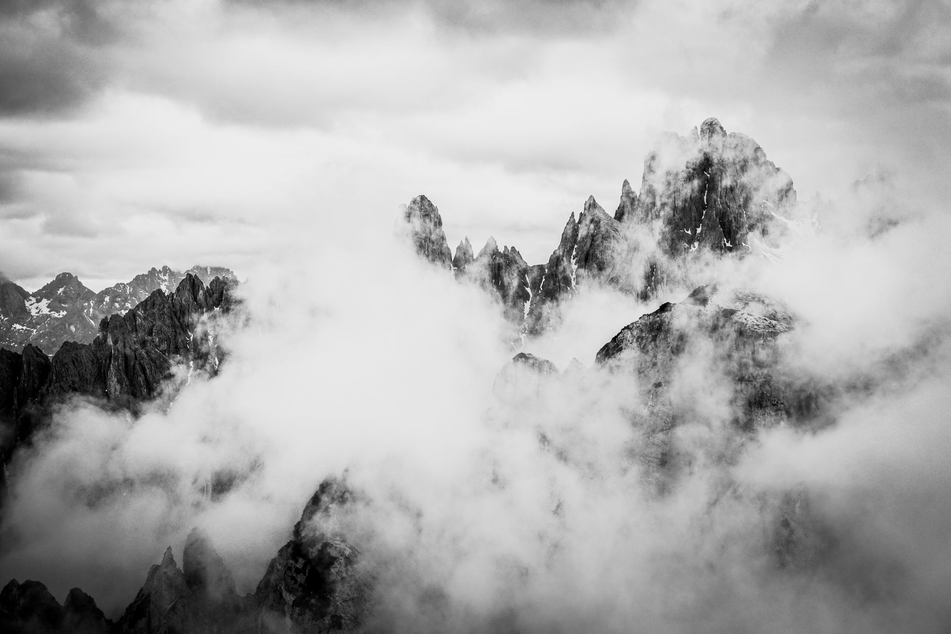 Dolomites jagged mountain ridges against dawn sky